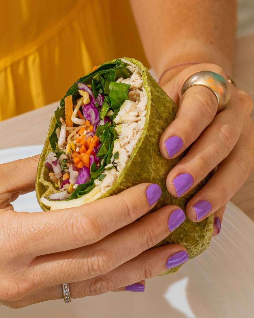 Gokéla customer enjoying a wrap